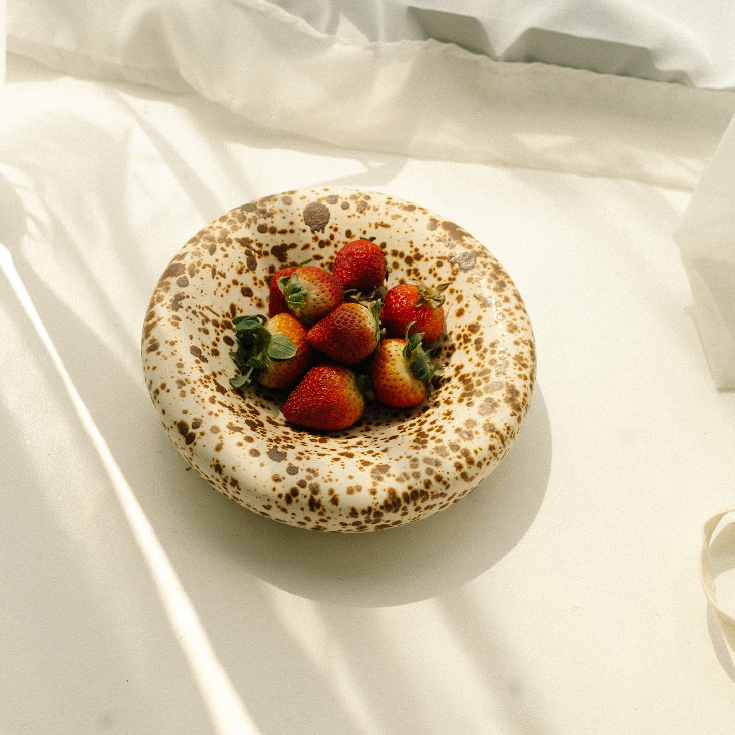casa azua, jewelry tray, chubby bowl, chunky plate, donut plate, coffee table decor, neutral decoration, modern ceramics, housewarming gift, serving bowl, dinner plate, dessert plate, cool modern plates.