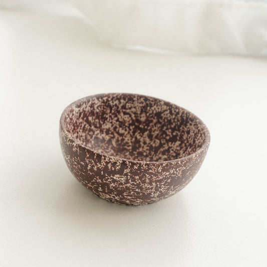 Cool Handmade Ceramic Bowl in white base with deep burgundy speckles.