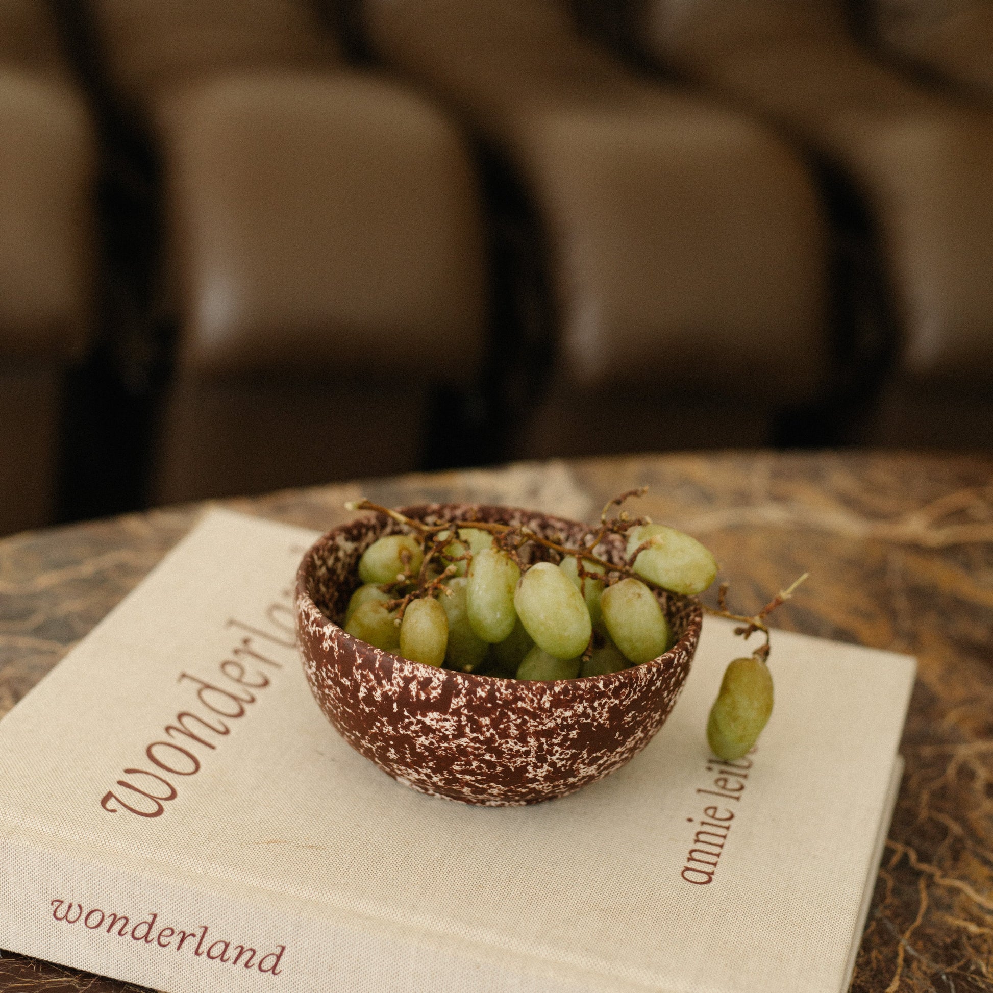 Cool Handmade Ceramic Bowl in white base with deep burgundy speckles.