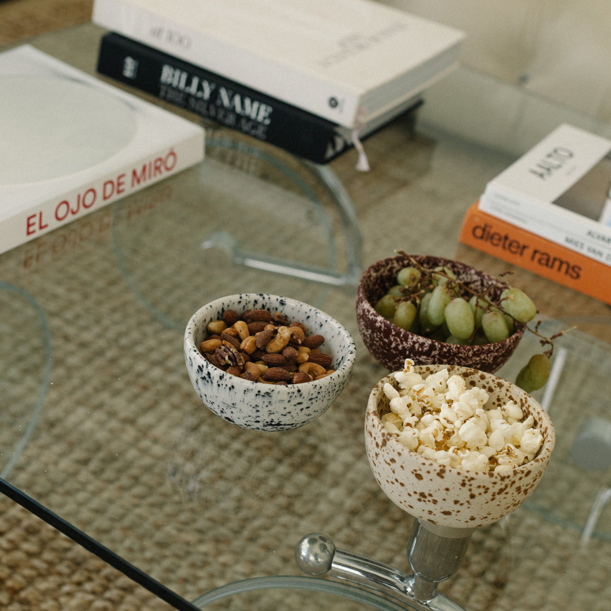 Cool Handmade Ceramic Bowl in white base with deep burgundy speckles.
