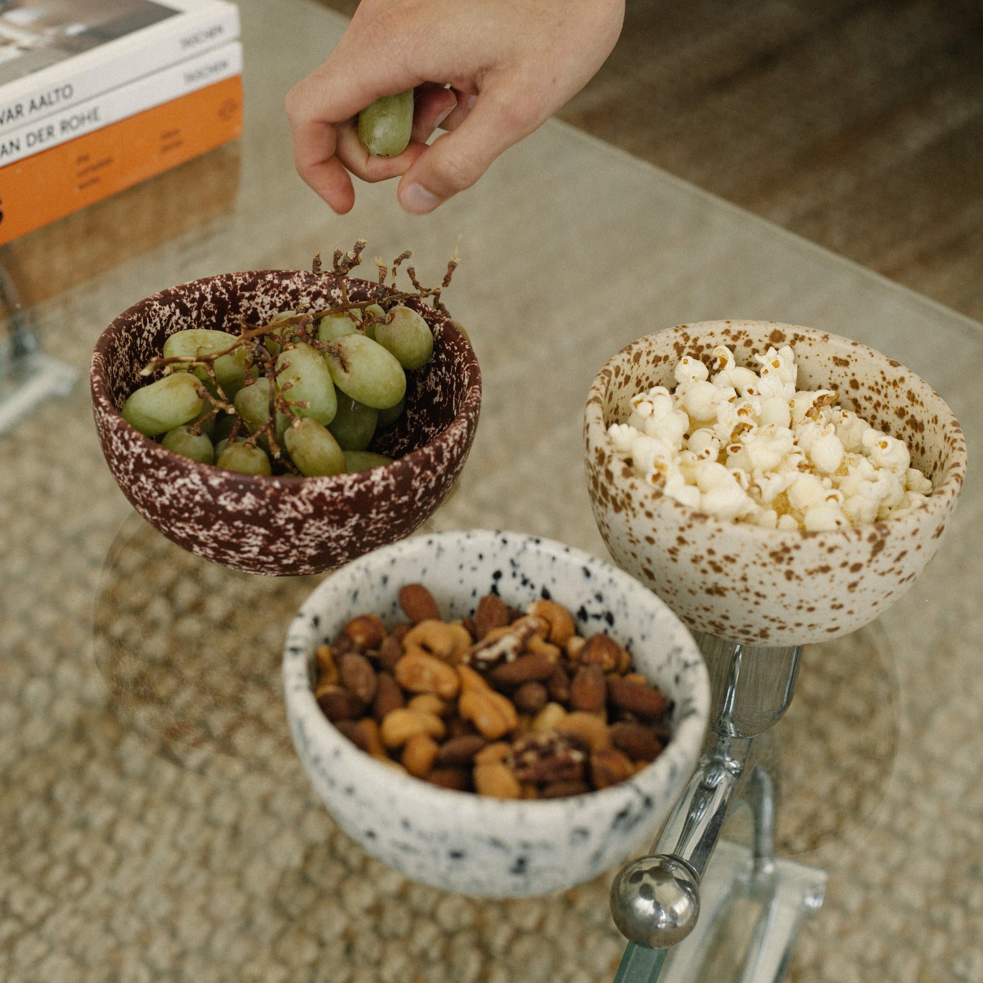 Cool Handmade Ceramic Bowl in white base with deep burgundy speckles.