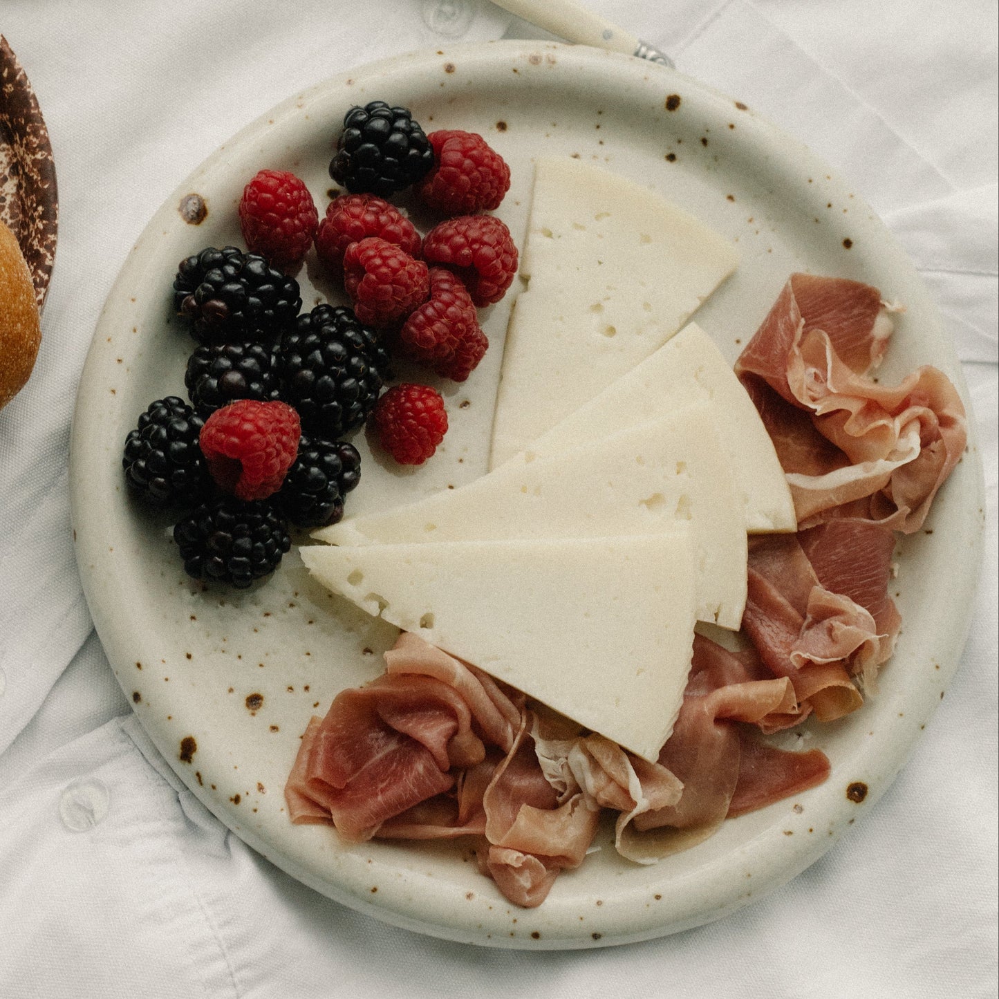 handmade ceramic plate, stoneware, large dinner plate, modern, gustaf westman plate, casa azua, artisan made plates, tableware, tabletop decor